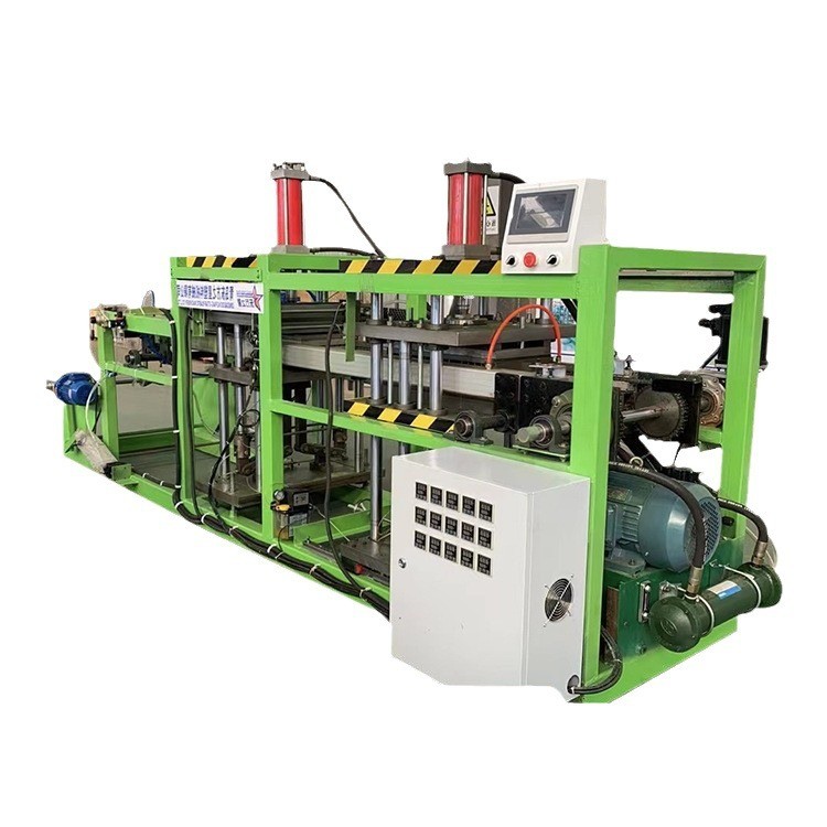 Vakuový tvarovací stroj se zásobníkem na semena